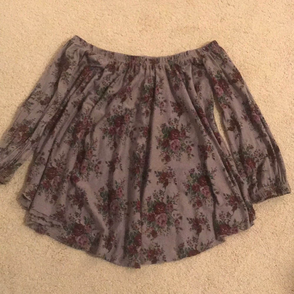 Off the shoulder flower shirt.